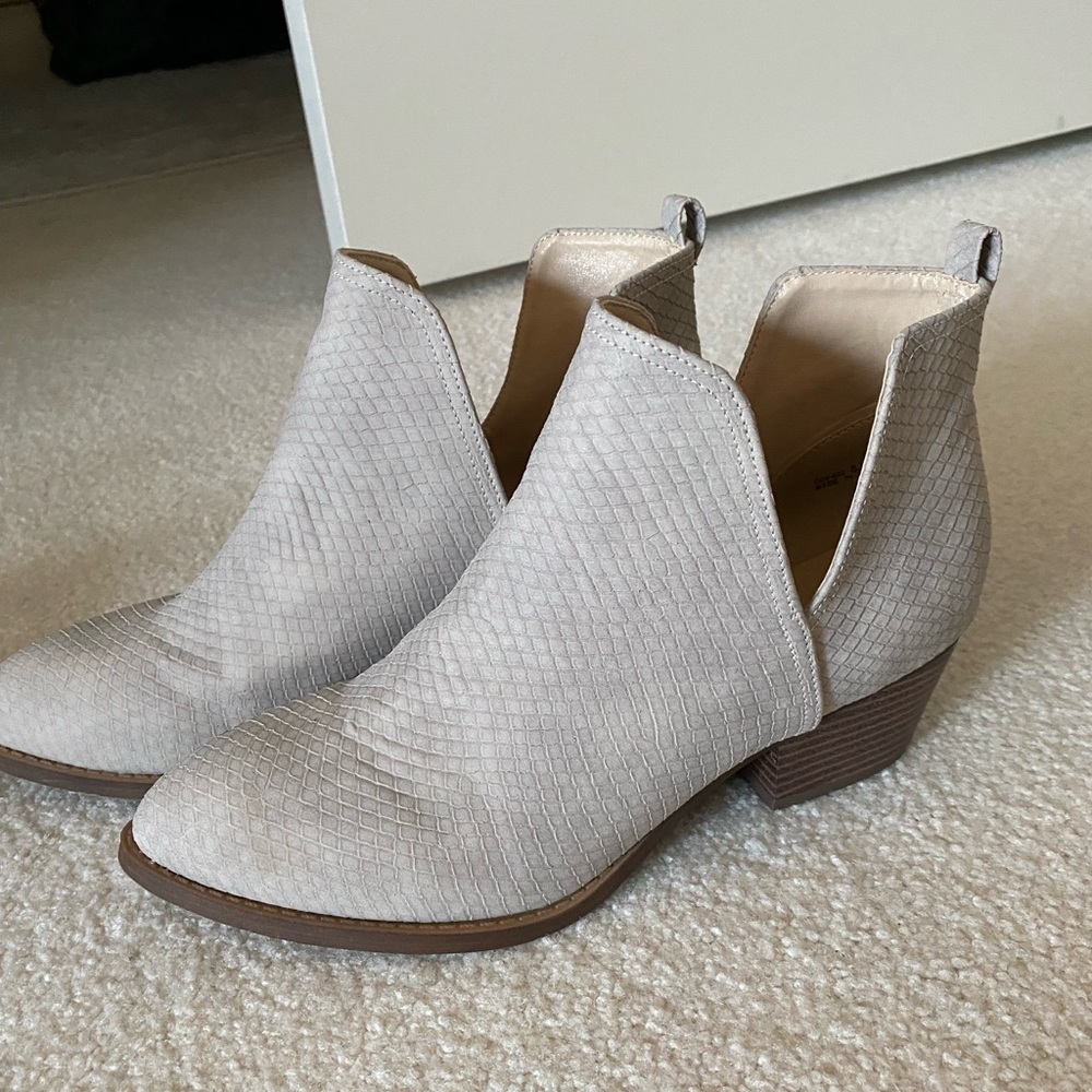 White boots with side cut out